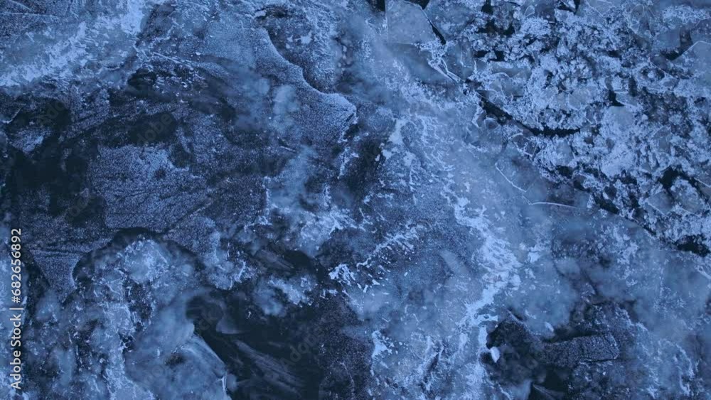 Drone shot flying towards frozen river Drone shot flying towards frozen river