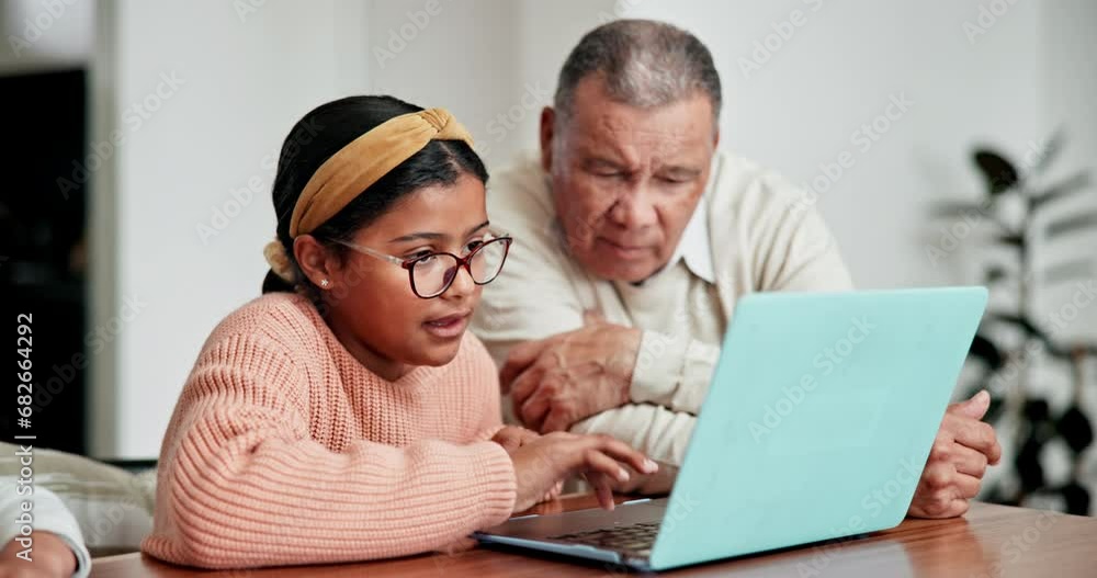 Grandparent, talking or child by laptop for education in living room, help and browse online with support. Senior man, girl or pc technology for remote learning, lesson subscription or love in home Grandparent, talking or child by laptop for education in living room, help and browse online with support. Senior man, girl or pc technology for remote learning, lesson subscription or love in home