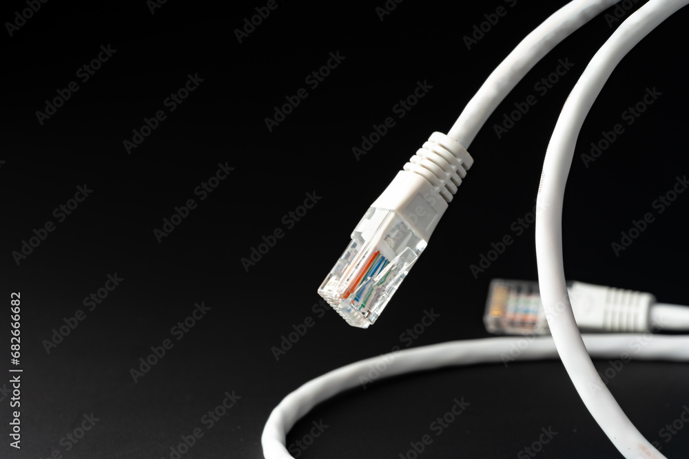 Network cable on black background studio shot Network cable on black background studio shot