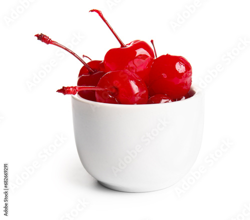 Bowl of tasty maraschino cherries on white background photo