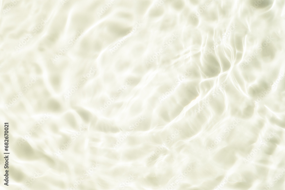 Summer sea natural background Beige surface, clear water with ripples and splashes. water waves in sunlight The water surface has waves. Summer sea natural background Beige surface, clear water with ripples and splashes. water waves in sunlight The water surface has waves.