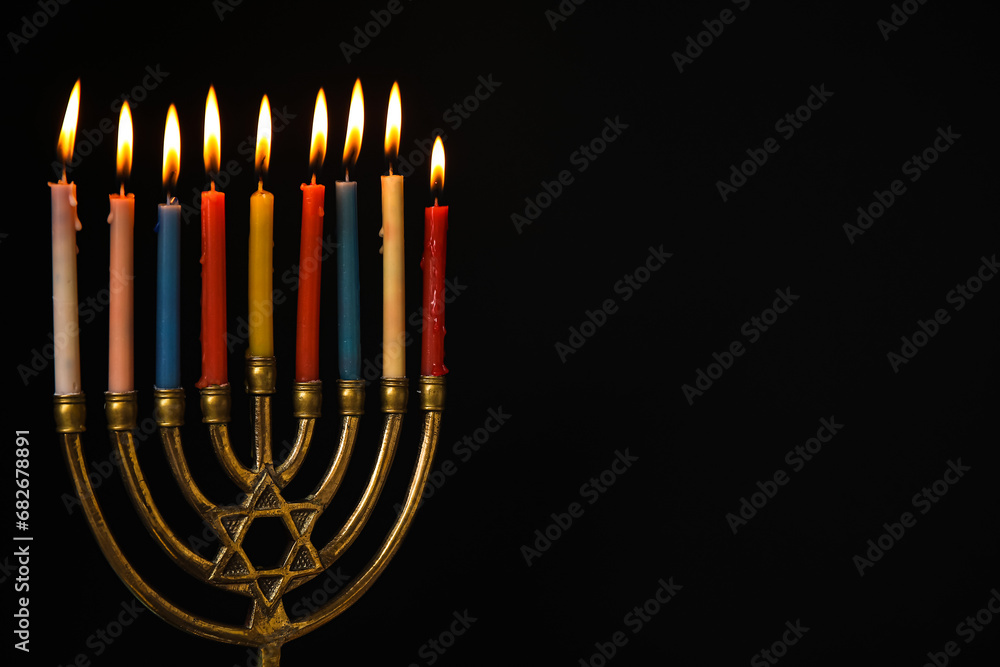 Menorah with candles for Hanukkah on black background Menorah with candles for Hanukkah on black background