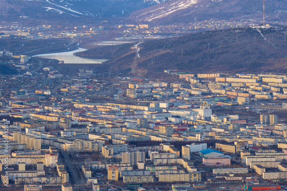 City of Magadan. Top view of city blocks, streets and buildings. Big northern city. Beautiful cityscape. Magadan, Magadan region, Far East of Russia.