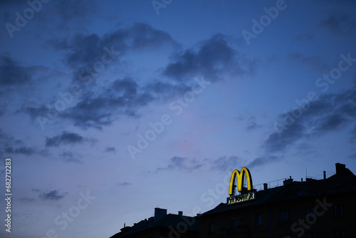 Mc Donald's restaurant logo at dusk. Budapest, Hungary - 7 May, 2019 photo