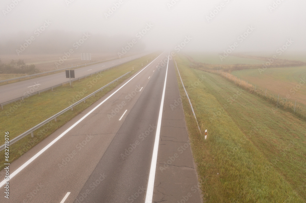 Drone photography of highway in a morning autumn fog Drone photography of highway in a morning autumn fog