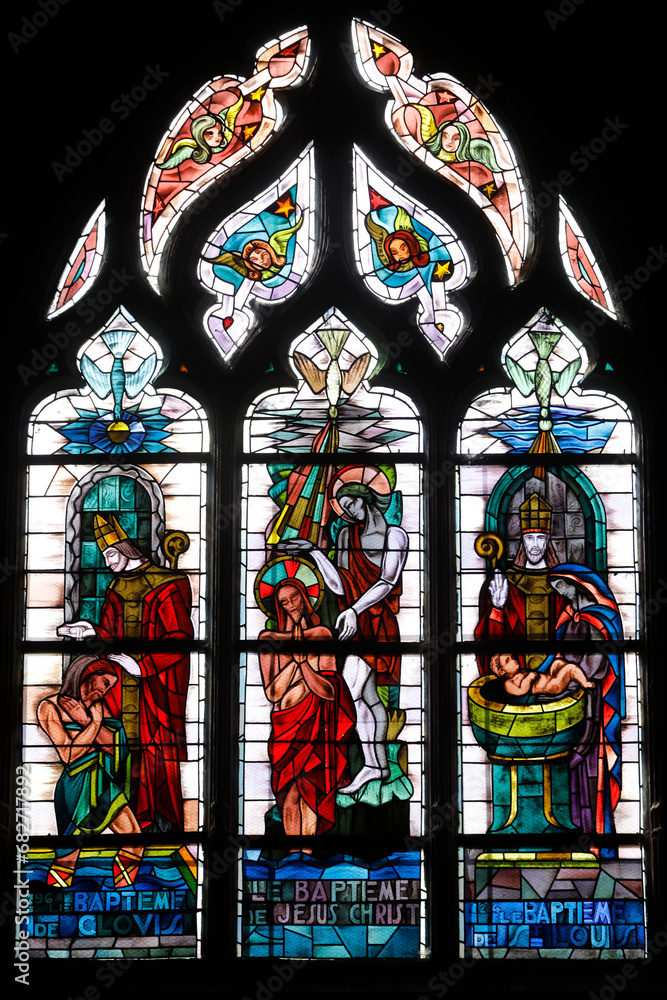 Stained glass in Notre Dame collegiate church, Poissy, France : Baptisms of Clovis, Jesus and St louis