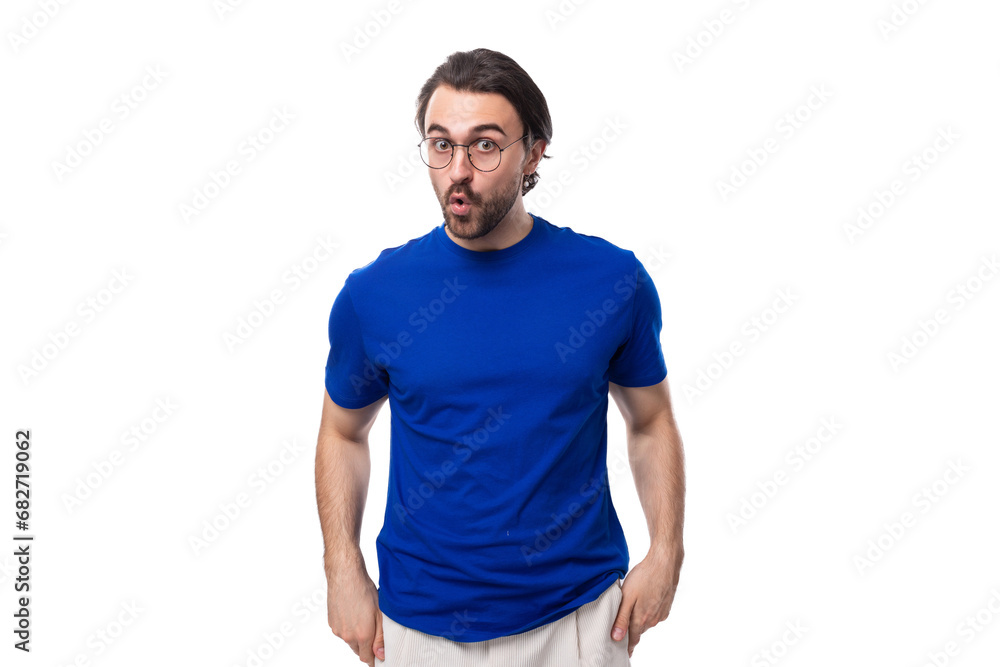 young smart european brunette man with beard thinks about strategy on background with copy space. brainstorm young smart european brunette man with beard thinks about strategy on background with copy space. brainstorm