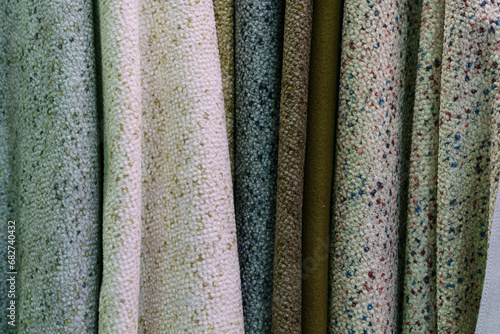 Colorful samples of fabrics for upholstery, fabrics for sewing.