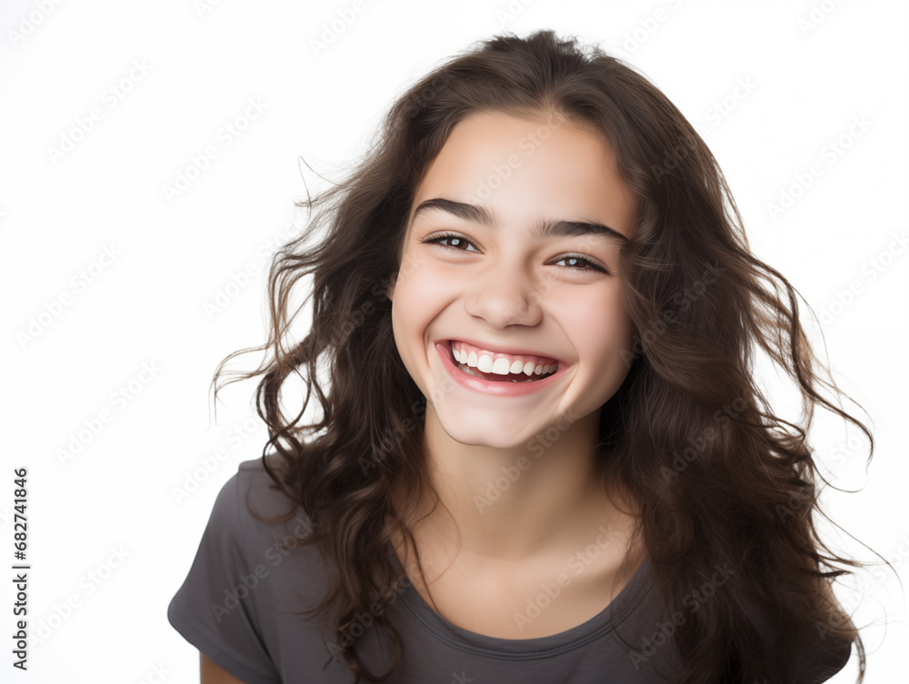Beautiful teenage girl laughing. Full mouth smile. Isolated on white background
Beautiful teenage girl laughing. Full mouth smile. Isolated on white background