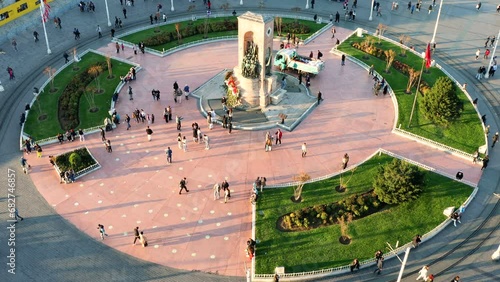 Istanbul city center, Taksim Square and Repuplic monument aerial view. Popular touristic destination. Peoples in Taksim square photo
