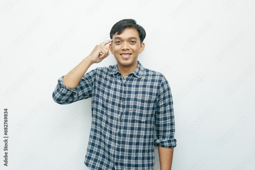 Portrait of Asian Indonesian man serious thinking gesture. Portrait of Asian Indonesian man serious thinking gesture.