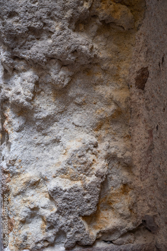 Obraz na płótnie Fragment of old stone wall. Rough textured surface w salonie