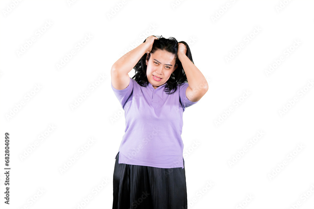 Portrait of displeased fat woman thinks her problems while scratching her head Portrait of displeased fat woman thinks her problems while scratching her head