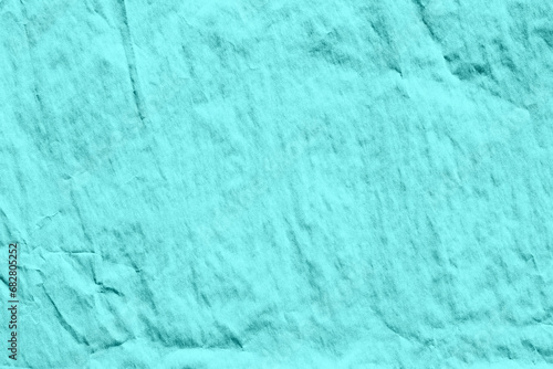Macro closeup of blue crumpled paper texture