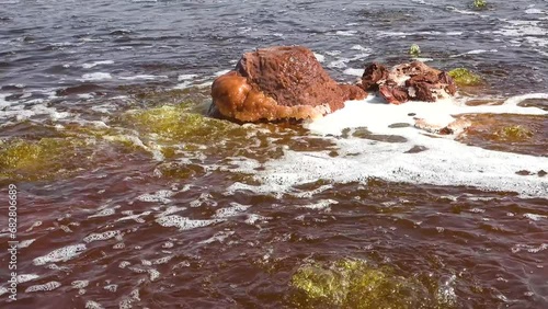 Dallol Sulfur springs and pools. The Sulphur springs create the unearthly colourful and beautiful landscape. Bubbling natural spring of mineral sparkling water.