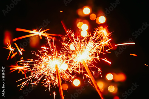 new year sparkler  fireworks. burning sparkler firework. Happy new year and Merry christmas concept. Happy holidays. Abstract blurred of Sparklers for celebration. Magic light. Winter Xmas decoration.