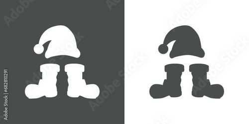 Tiempo de Navidad. Logo con sombrero y botas de Santa Claus para su uso en tarjetas y felicitaciones photo