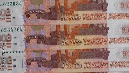 Russian money five thousand ruble moving, close-up photo
