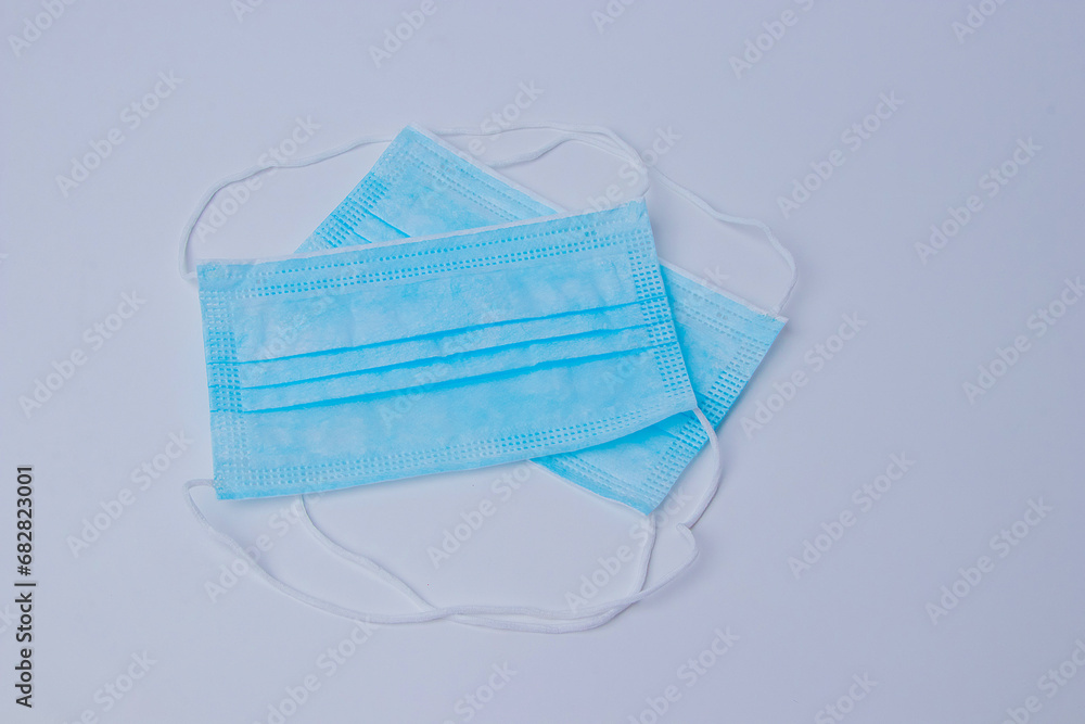 2 mask that has been placed on white background
2 mask that has been placed on white background