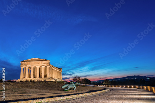 Concord temple at dusk. Valley of the Temples archaeological park, Agrigento / Sicily IT 