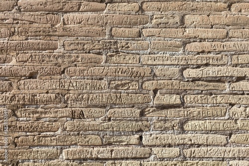 Acts of vandalism on the walls of Colosseum in Rome, Italy.