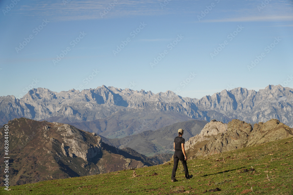 Wandering Amidst the Peaks: A Young Adventurer Strolls through the Majestic Mountains of Picos de Europa
