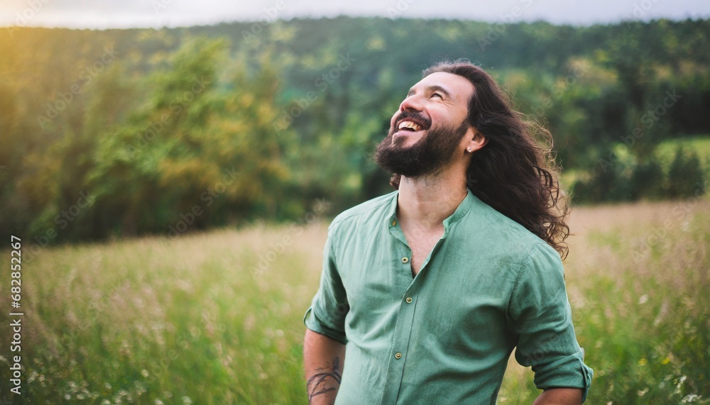 portrait of a man smiling on a meadow portrait of a man smiling on a meadow