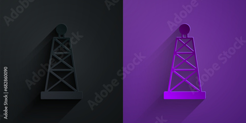Paper cut Oil rig icon isolated on black on purple background. Gas tower. Industrial object. Paper art style. Vector photo