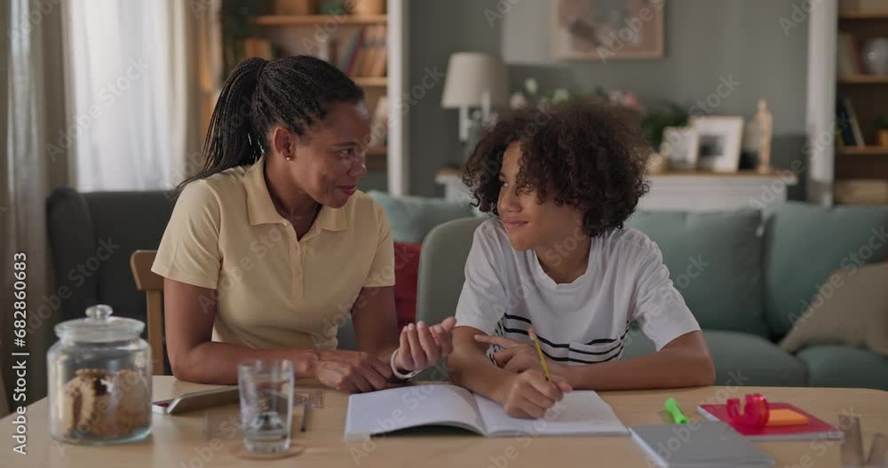 mother and son doing homework mother and son doing homework