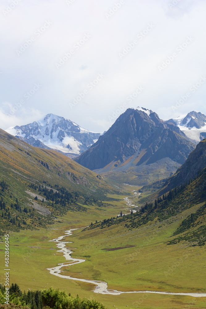 Ak-Suu valley with a glacier river on Fifth stage of Ak-Suu Traverse trek in Tian Shan mountains, Karakol, Kyrgyzstan