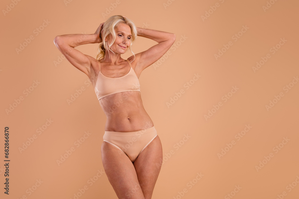 Naklejka premium Photo of attractive lady enjoy her hair body feel positive self care concept isolated over pastel color background