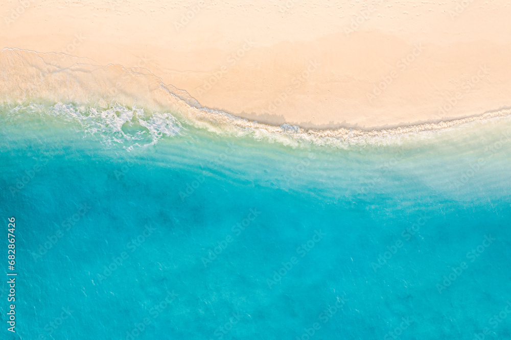 Relaxing aerial beach scene. Summer vacation holiday destination banner. Waves surf crash amazing blue ocean lagoon, sea shore, coastline. Perfect aerial drone top view. Peaceful bright beach, seaside