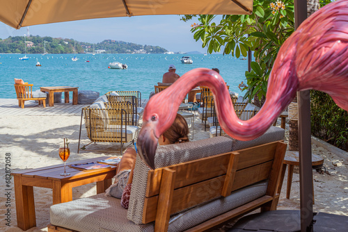 Visit a popular pink flamingo concept restaurant in a cafe next to the sea, Sue Flamingo, Ao Yon Beach, Phuket Thailand