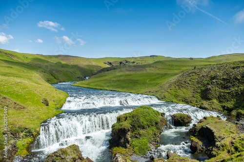 kogar river in iceland which creates skogafoss waterfalls - South Iceland  Europe - popular destination for tourists