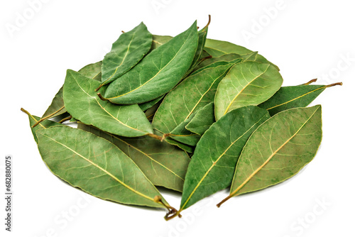Heap of laurel bay leaves on white background
