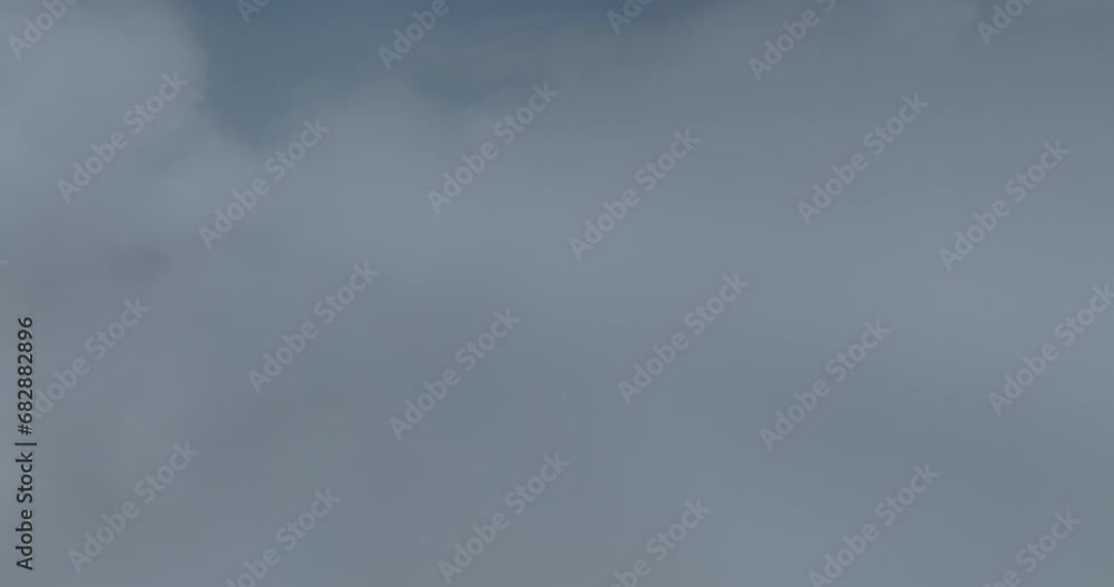Drone flight above clouds during a misty sunrise morning Drone flight above clouds during a misty sunrise morning