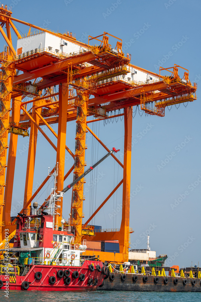 crane loading cargo container from truck to container ship in the international terminal logistic sea port concept freight shipping by ship, webinar banner forwarder mast. crane loading cargo container from truck to container ship in the international terminal logistic sea port concept freight shipping by ship, webinar banner forwarder mast.