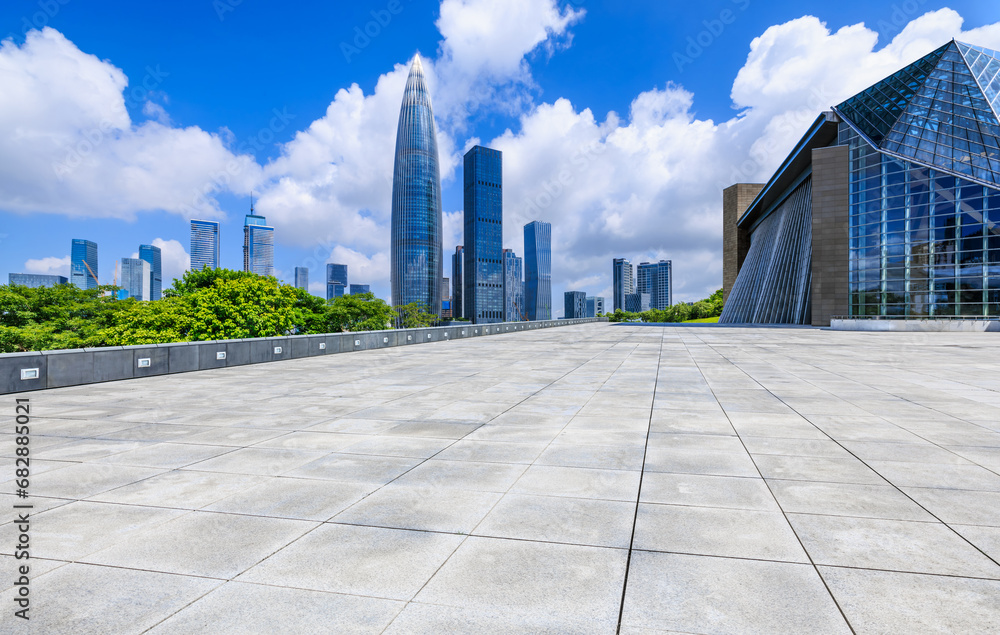 City square and skyline with modern buildings scenery in Shenzhen, Guangdong Province, China. Empty square floor and skyline background.