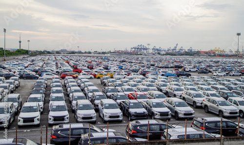 Aerial view new cars parking for sale stock lot row, New cars dealer inventory import export business commercial global, Automobile and automotive industry distribution logistic transport worldwide.