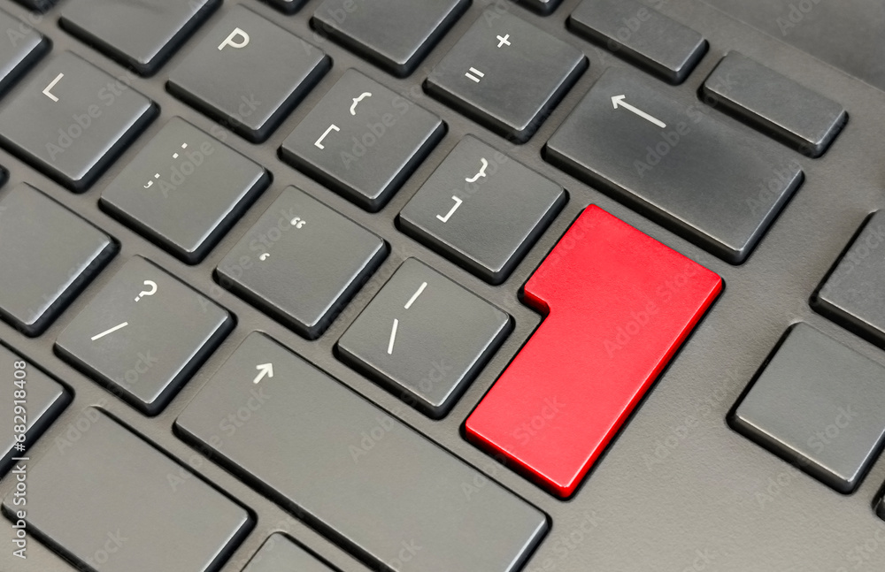 Close-up keyboard view with red button Close-up keyboard view with red button