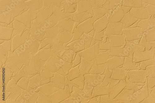 Yellow bright light paint abstract pattern plaster surface stucco wall texture background structure backdrop