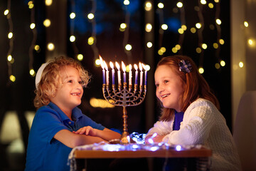Kids celebrating Hanukkah. Festival of lights.
