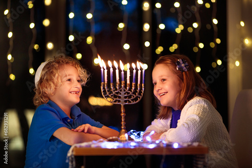 Kids celebrating Hanukkah. Festival of lights.