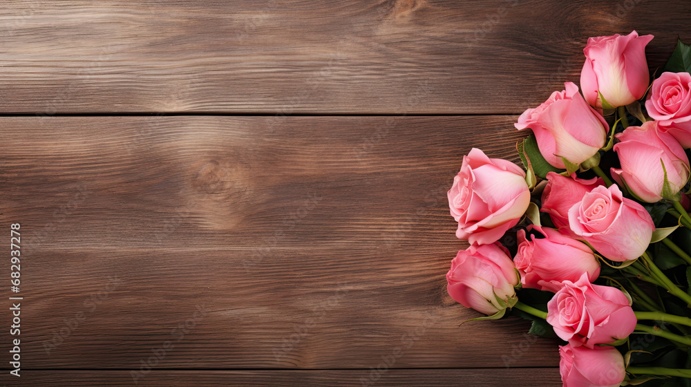 Pink roses on a wooden table, copy space, Mother's Day, Valentine's Day background Pink roses on a wooden table, copy space, Mother's Day, Valentine's Day background