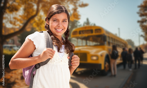 Happy Young Hispanic Girl W...