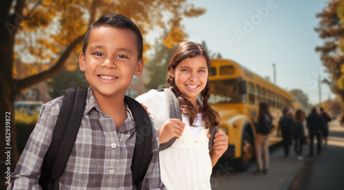 Happy Young Hispanic Boy an...