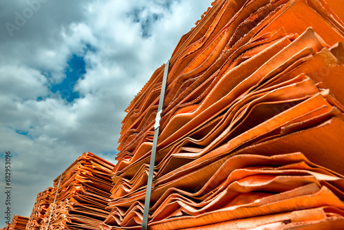 Fotografie Copper cathodes loaded on a train in a copper mine ready to be delivered, Chile
