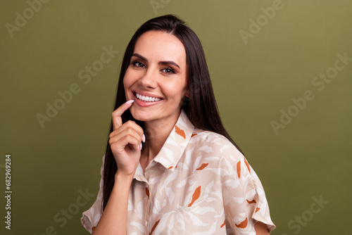 Photos Portrait of attractive nice feminine young cheerful lady touch chin admiring smi