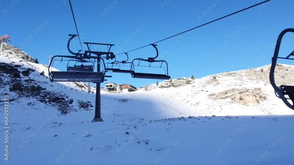 Ride on a chairlift in European Alps. Hintertux glacier in autumn. Ride on a chairlift in European Alps. Hintertux glacier in autumn.