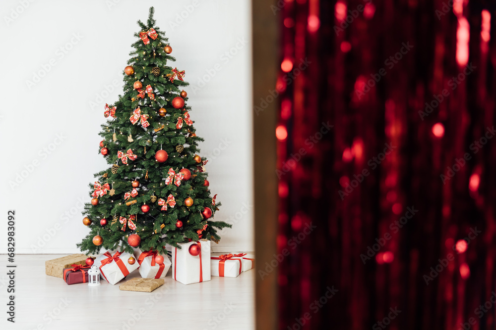 Interior christmas tree with gifts toys decorated new year